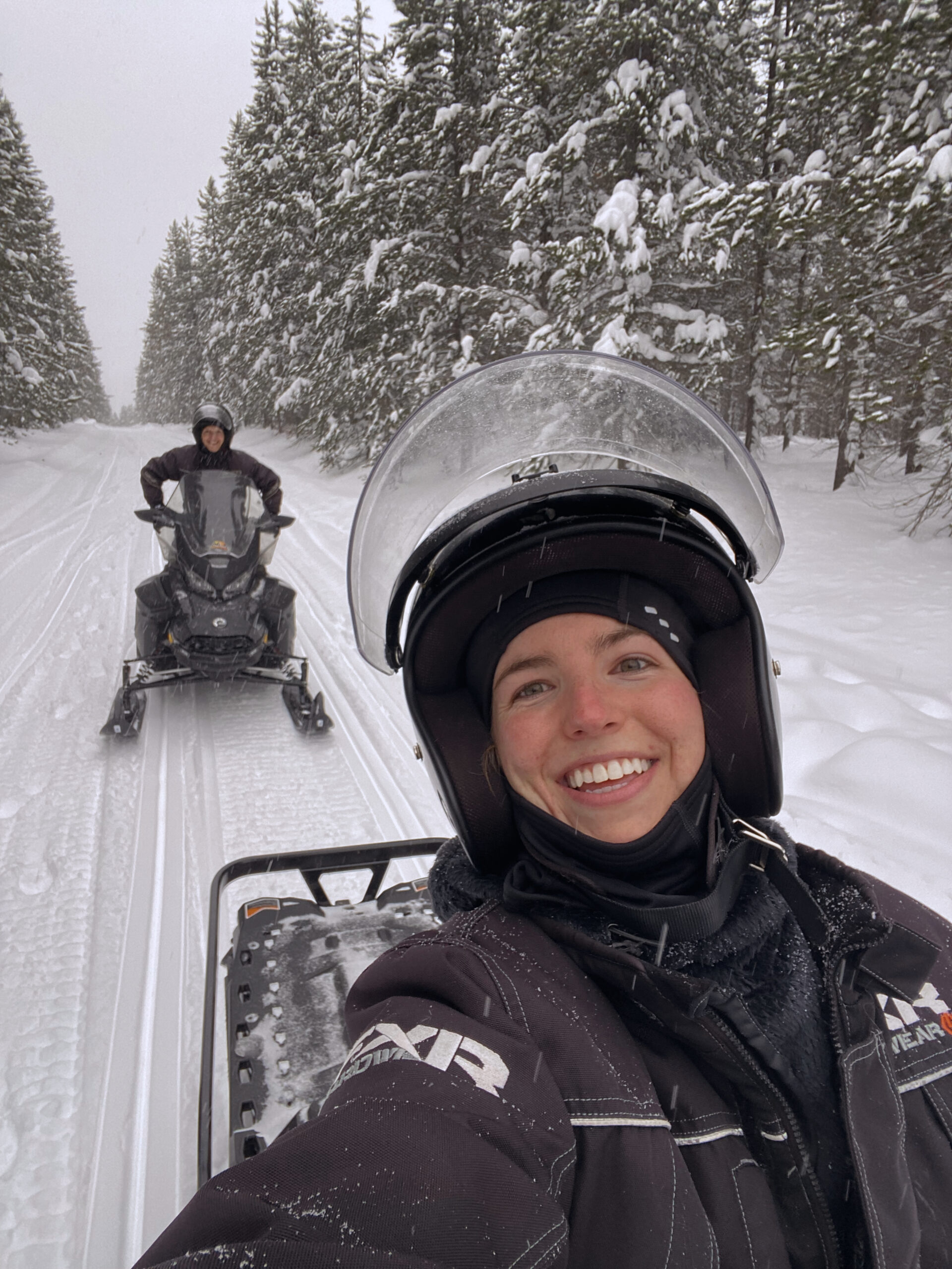 snowmobiling in the winter in jackson hole, wyoming